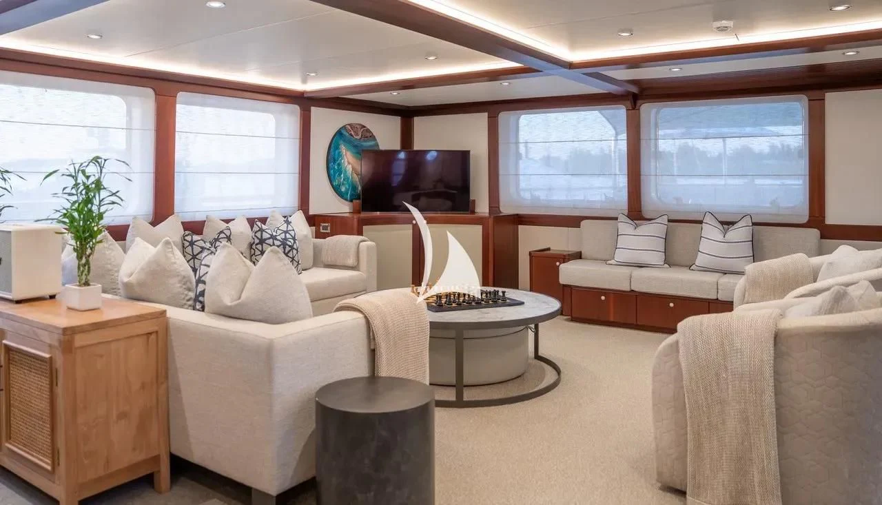 a living room with a large window aboard LATITUDE Yacht for Sale