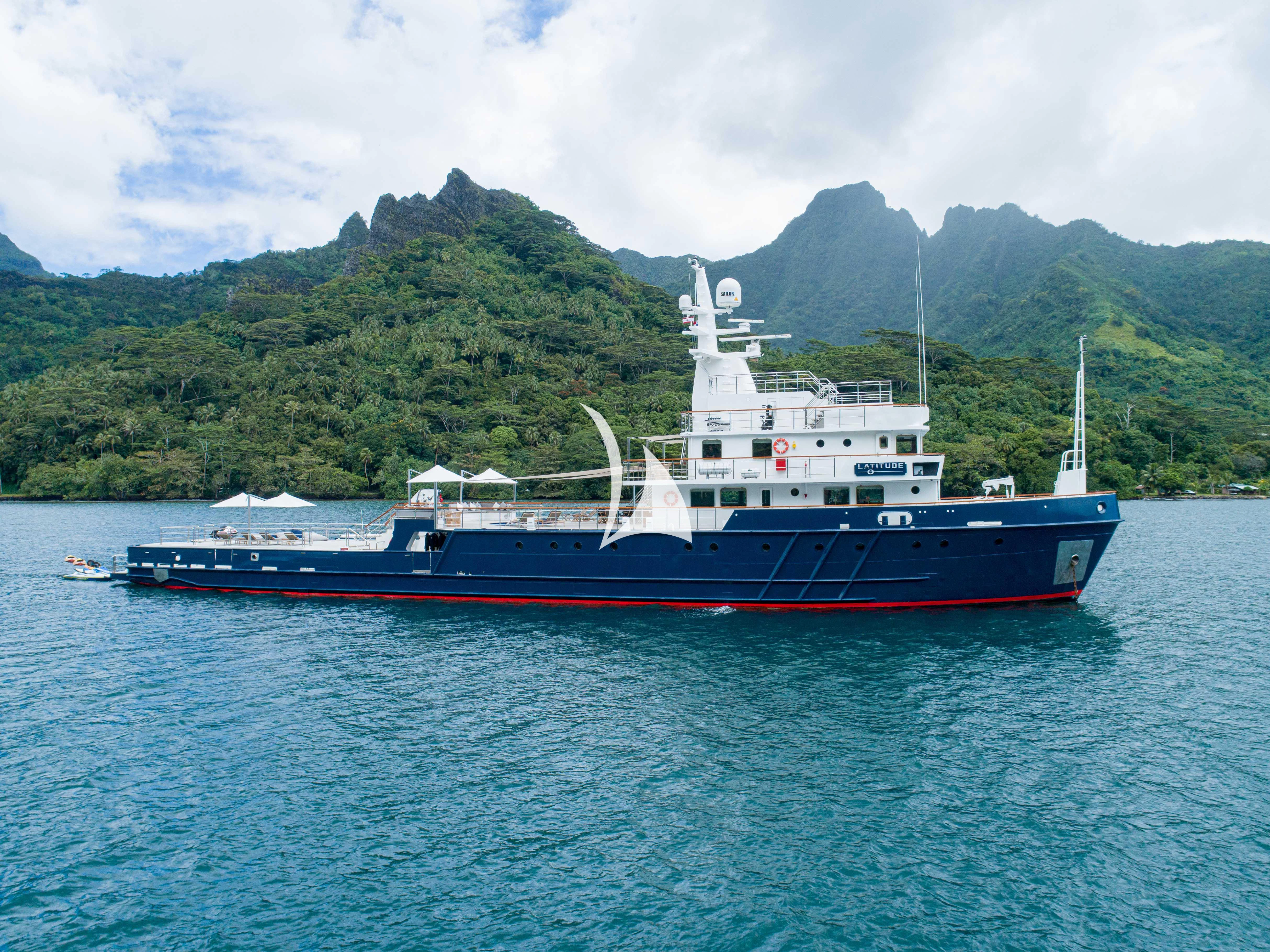 a large boat in the water aboard LATITUDE Yacht for Sale