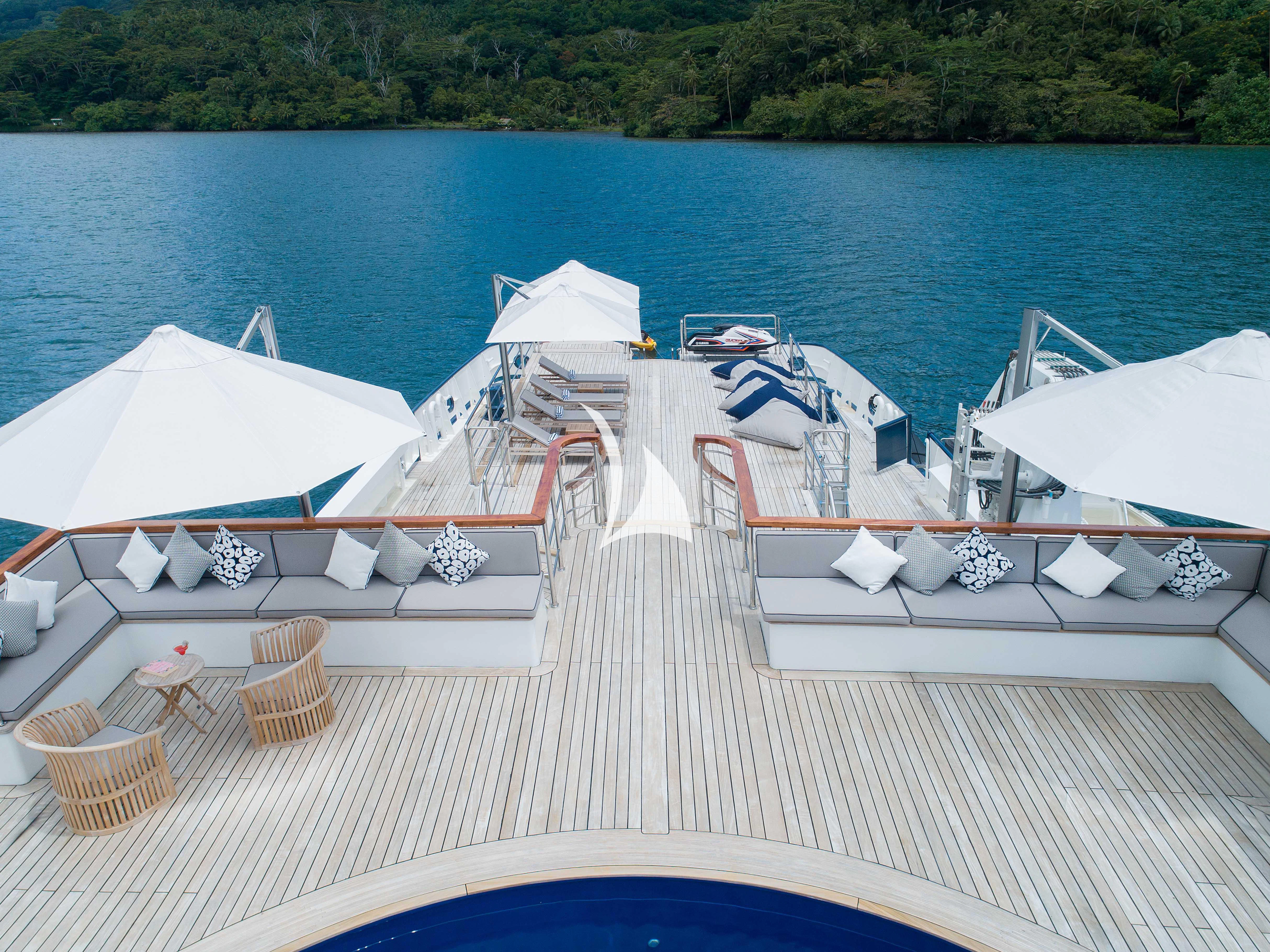 a group of white boats on a dock aboard LATITUDE Yacht for Sale