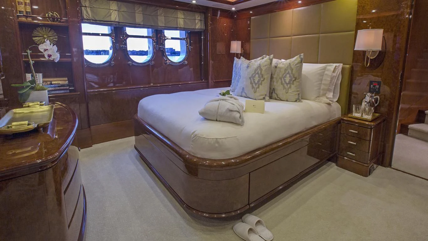 a bed in a room aboard DOMANI Yacht for Sale