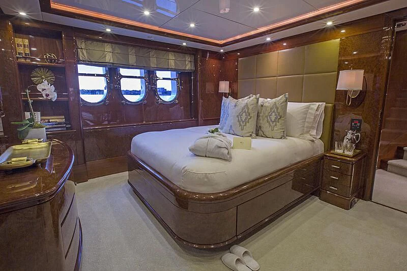a bed in a room aboard DOMANI Yacht for Sale