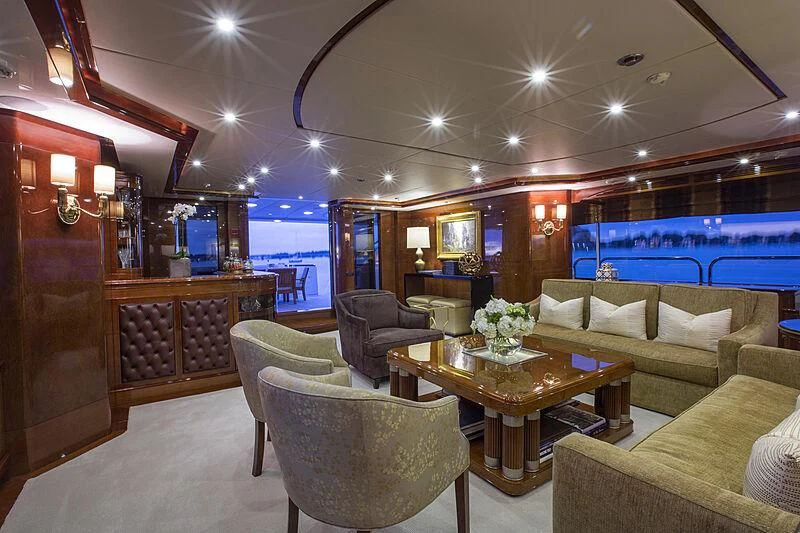 a living room with a large window aboard DOMANI Yacht for Sale
