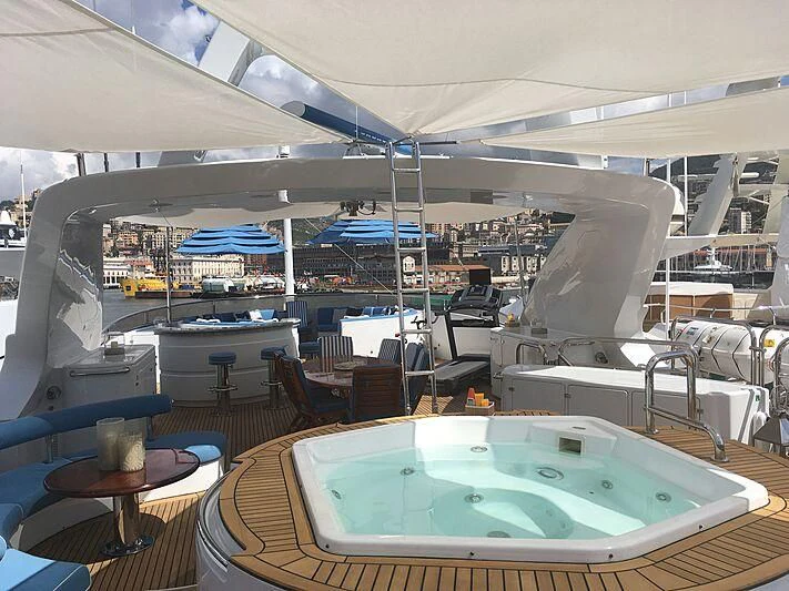 a pool table in a room aboard DOMANI Yacht for Sale