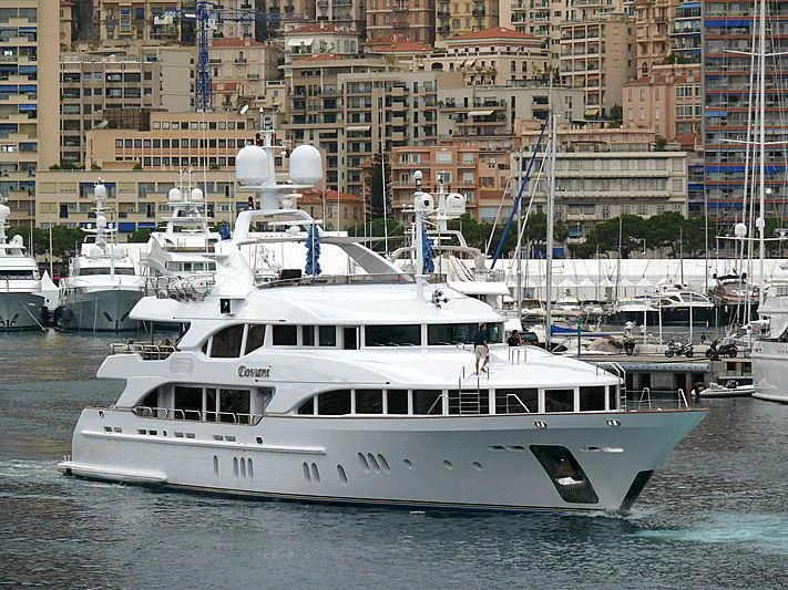 a white boat in the water aboard DOMANI Yacht for Sale
