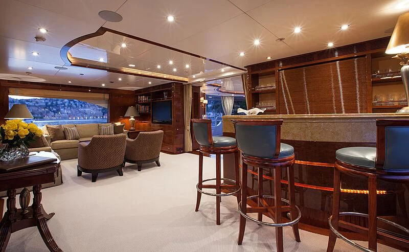 a living room with a large window aboard DOMANI Yacht for Sale