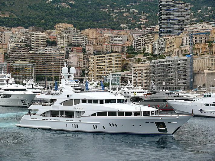 a group of boats in a harbor aboard DOMANI Yacht for Sale