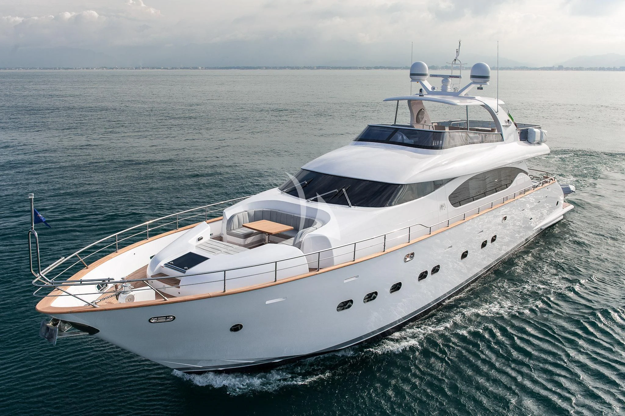 a white yacht in the water aboard MIREDO Yacht for Sale