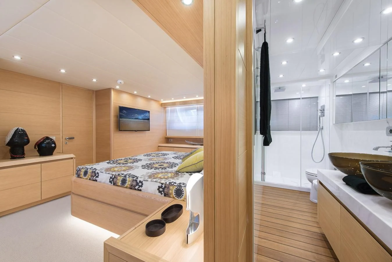 a bedroom with a bed aboard MIREDO Yacht for Sale