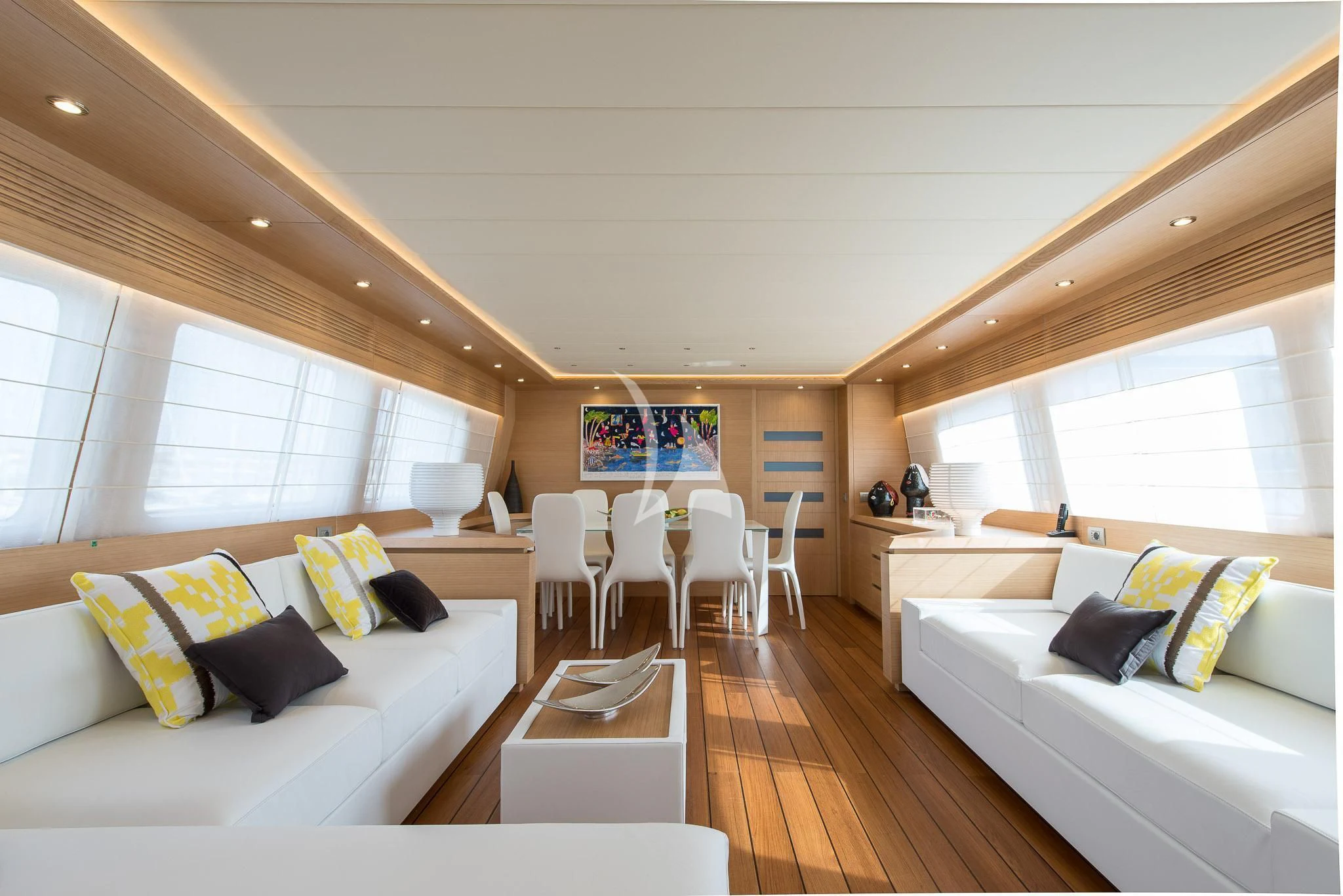 a room with a couch and a table and chairs aboard MIREDO Yacht for Sale