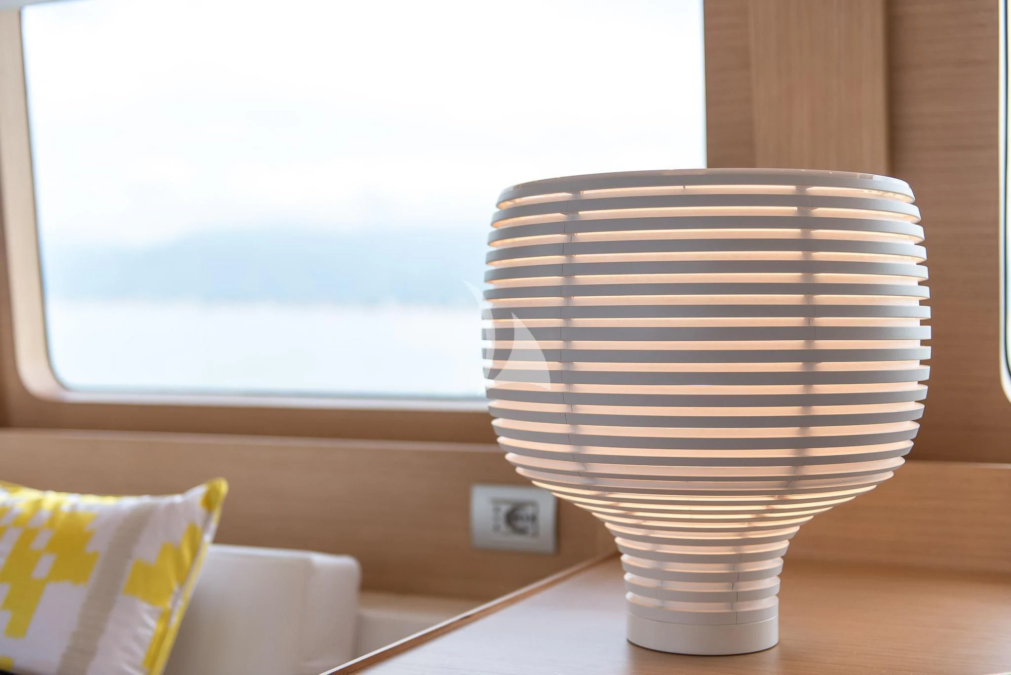 a lamp on a table aboard MIREDO Yacht for Sale