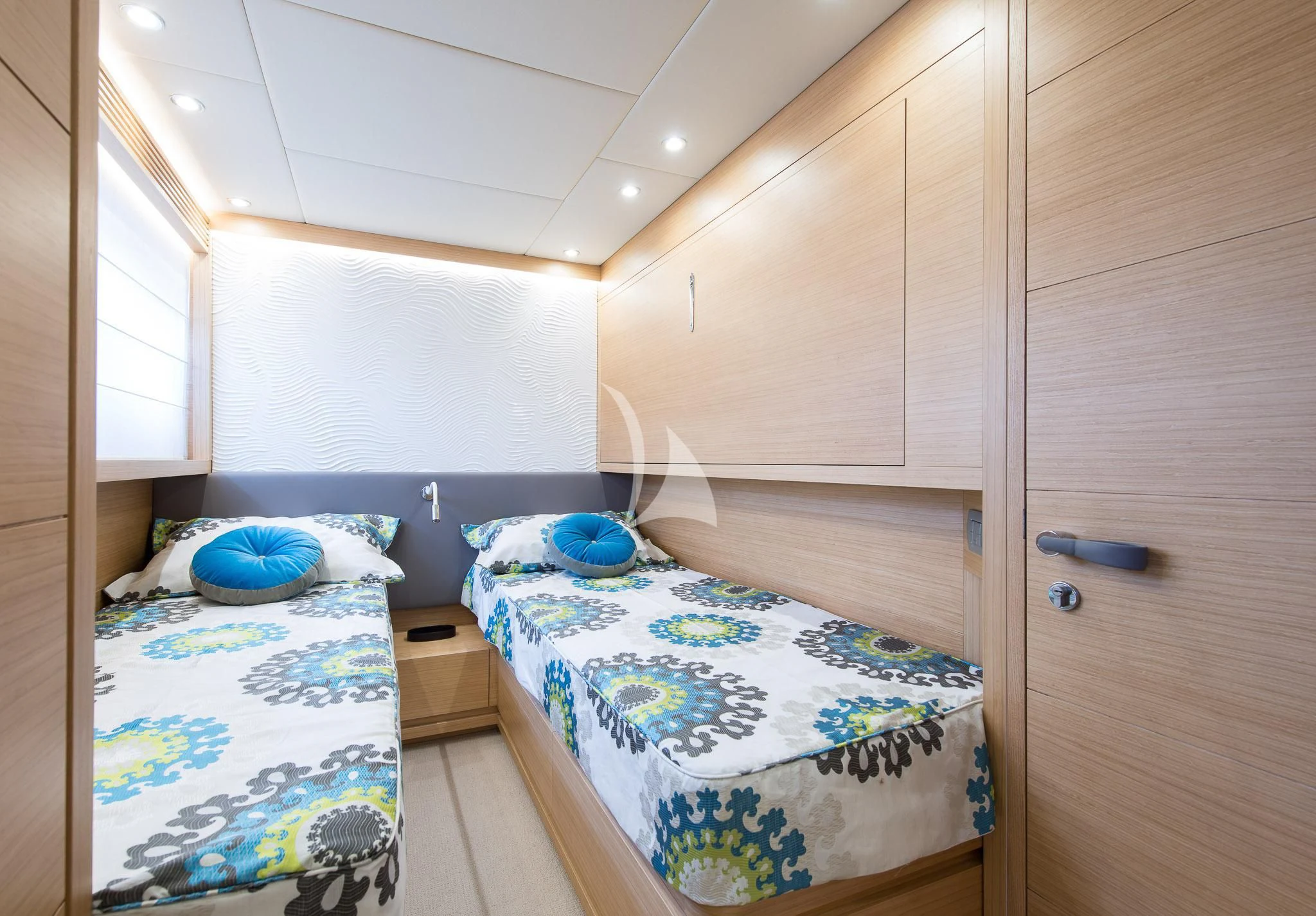 a small bedroom with a bed aboard MIREDO Yacht for Sale