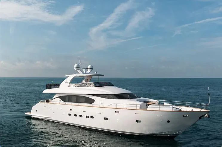 a white yacht in the water aboard MIREDO Yacht for Sale