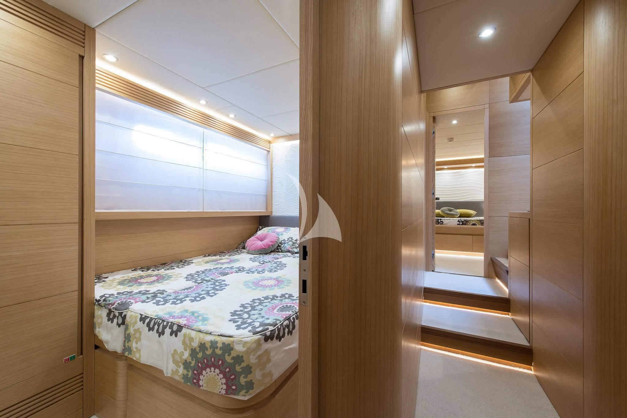 a bed in a room aboard MIREDO Yacht for Sale