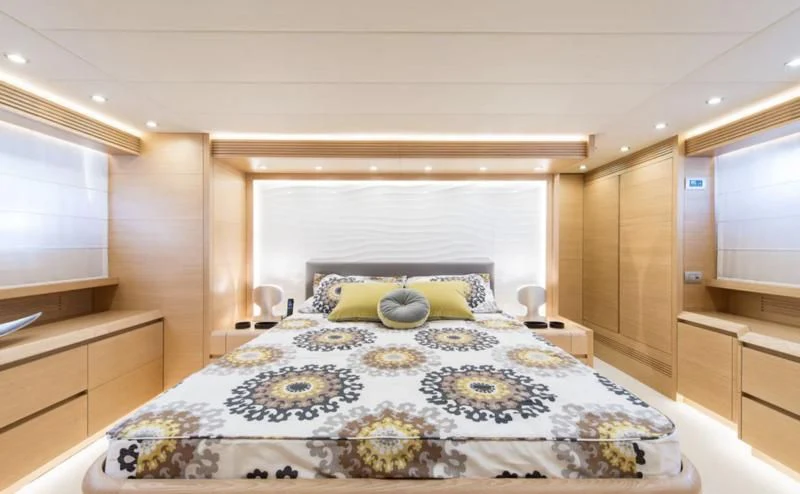 a bed in a room aboard MIREDO Yacht for Sale
