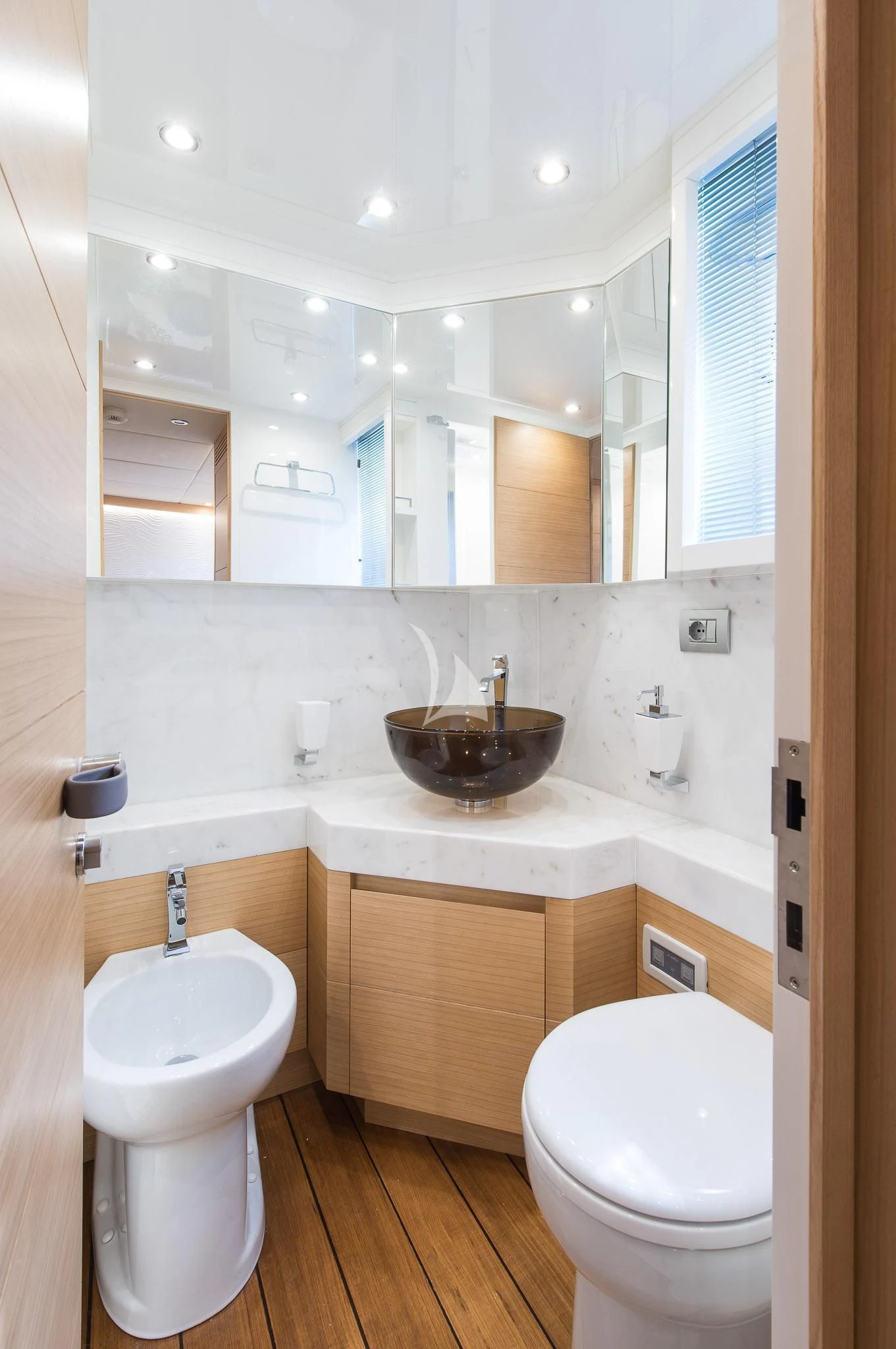 a bathroom with a sink and a toilet aboard MIREDO Yacht for Sale