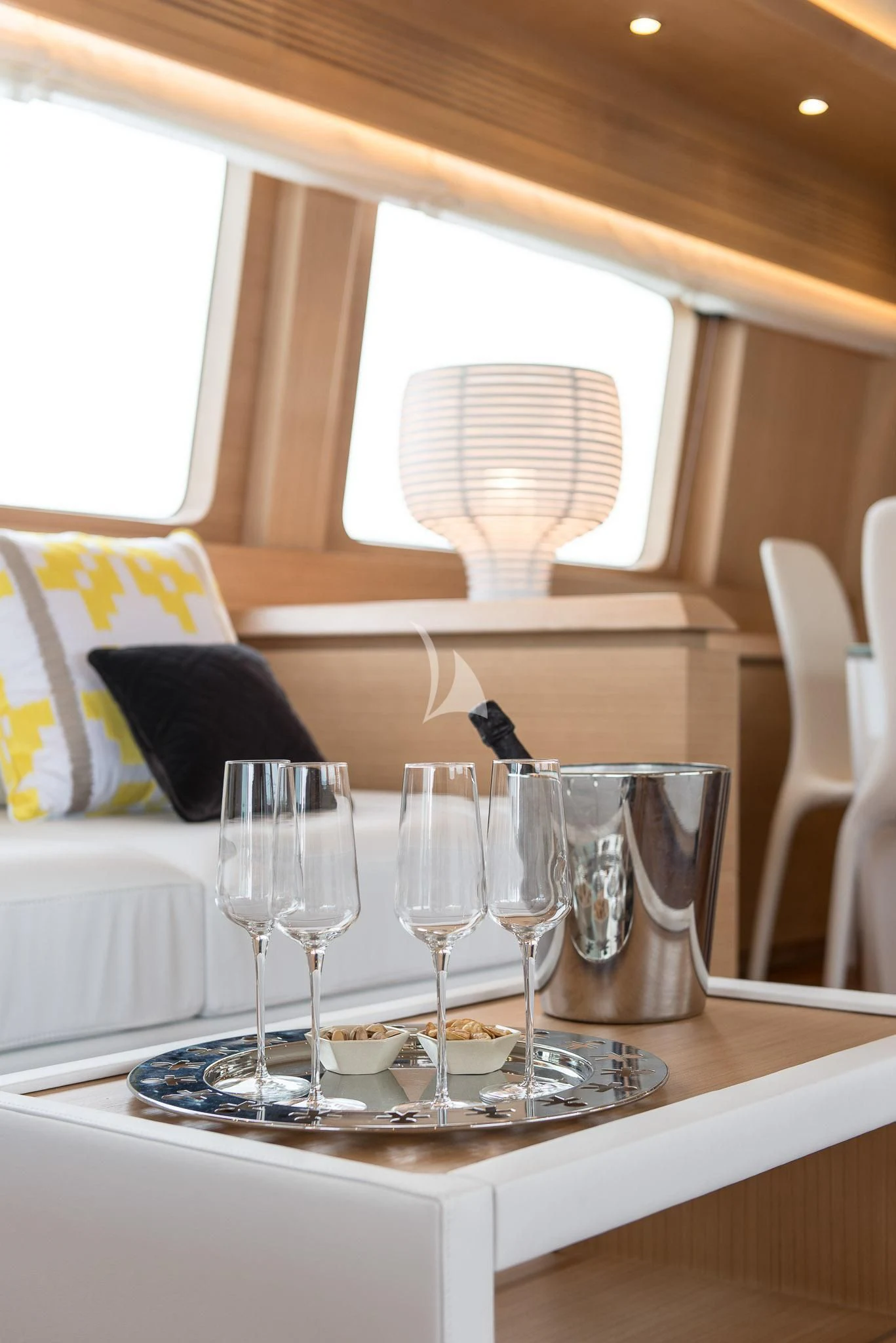 a table with wine glasses aboard MIREDO Yacht for Sale