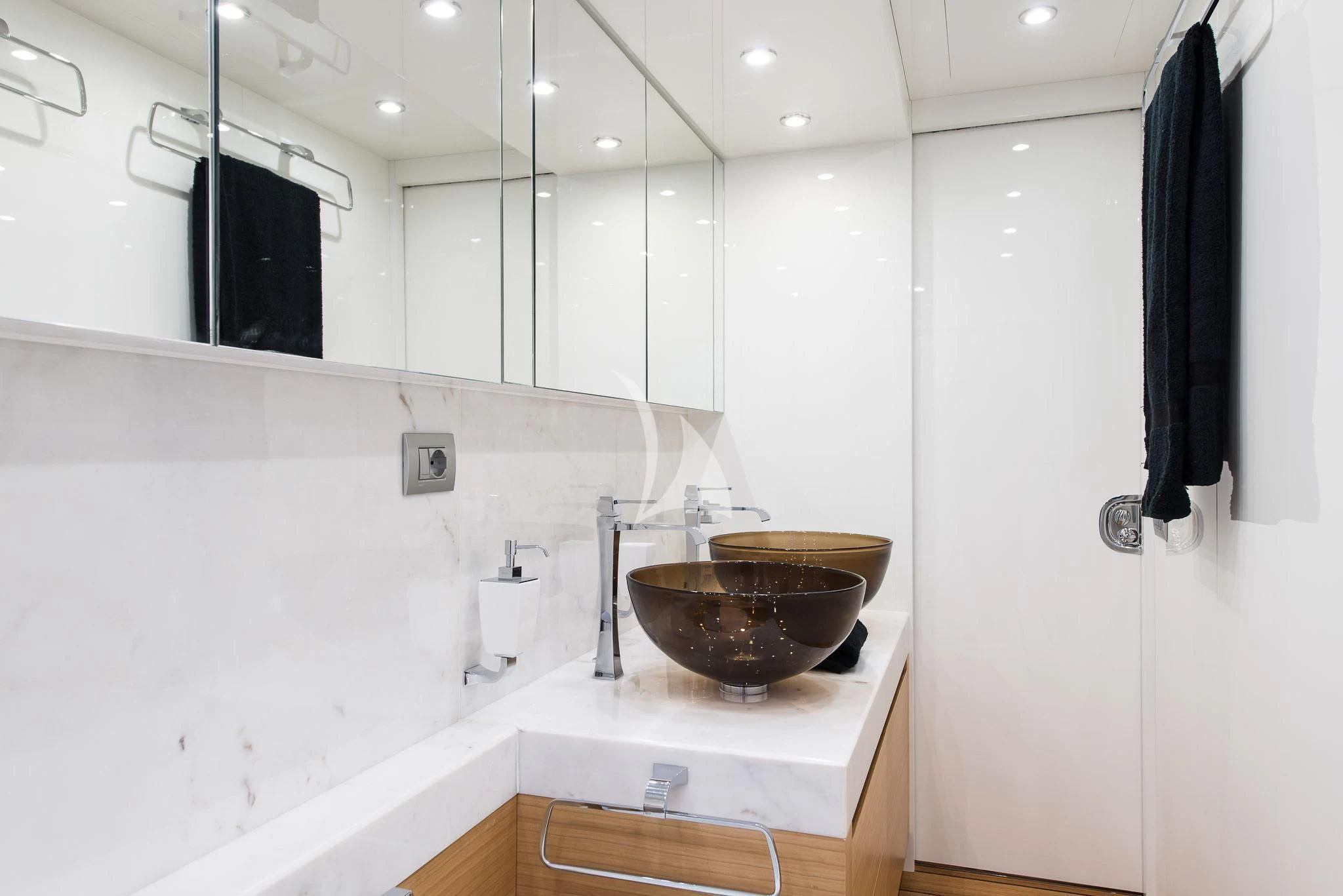 a bathroom with a bowl of water aboard MIREDO Yacht for Sale