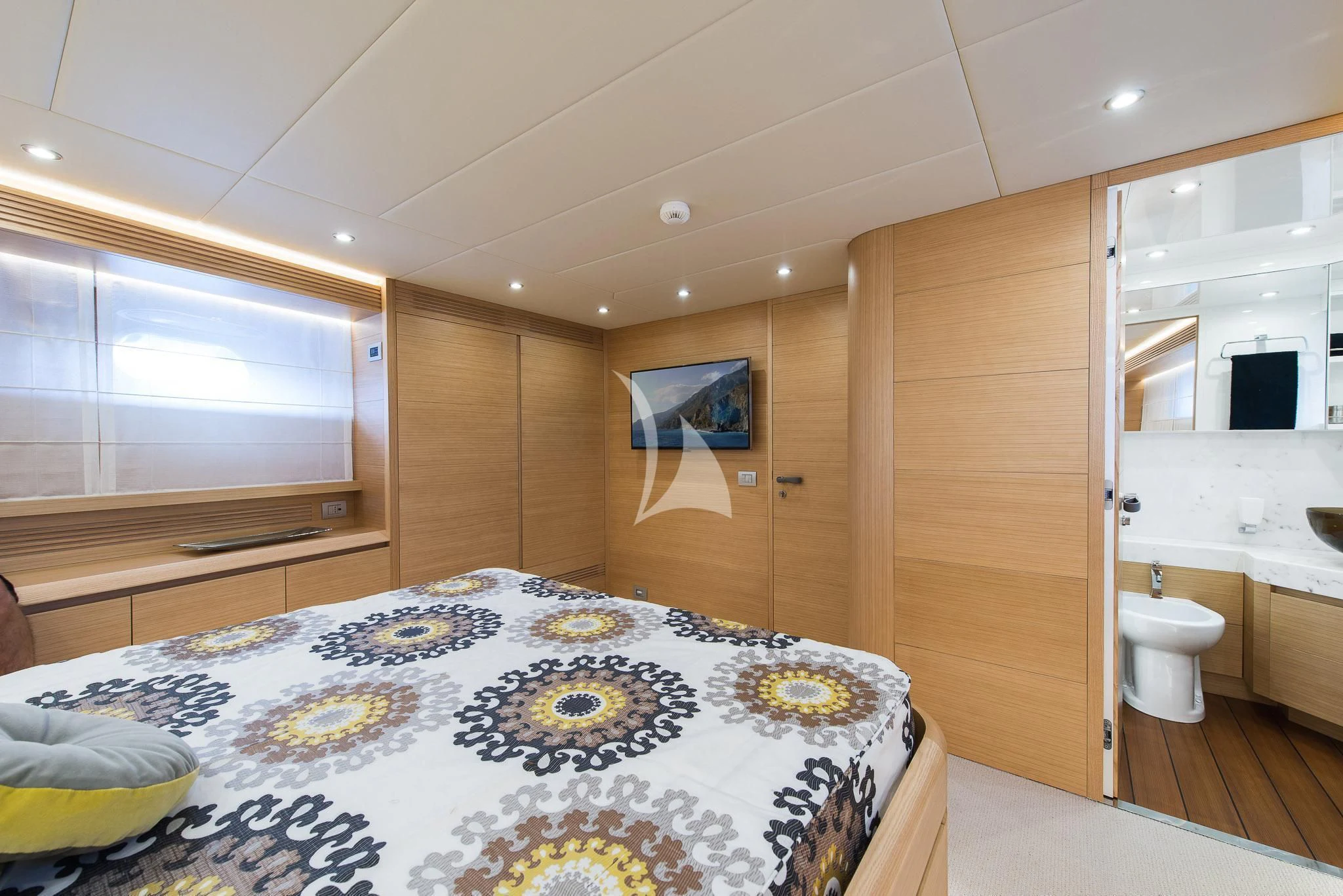 a bathroom with a large bed aboard MIREDO Yacht for Sale