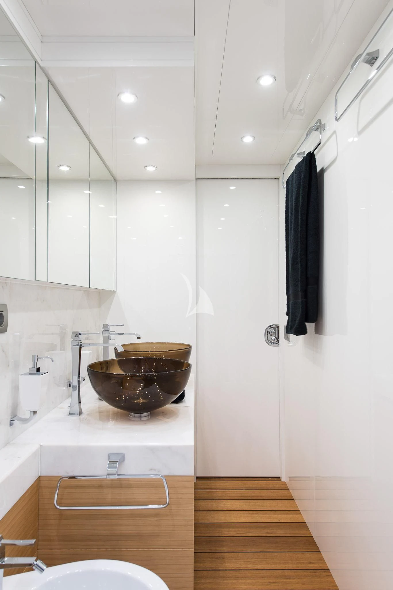 a bathroom with a wood floor aboard MIREDO Yacht for Sale