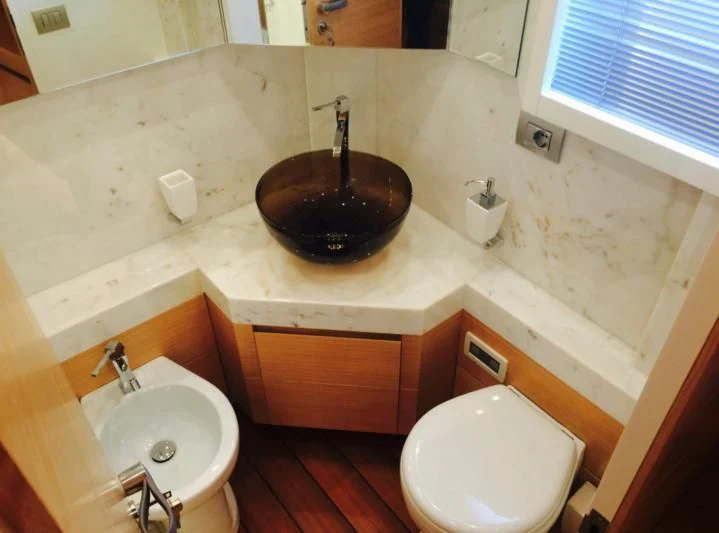 a bathroom with a sink and toilet aboard MIREDO Yacht for Sale