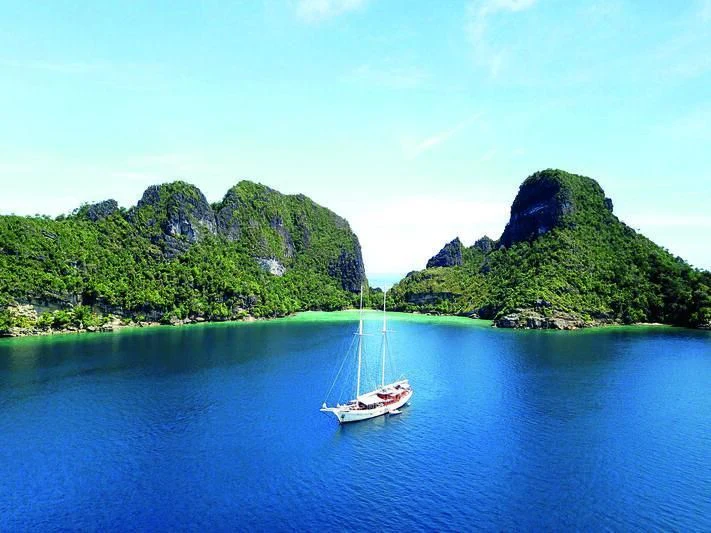 a boat in the water aboard MUTIARA LAUT Yacht for Sale