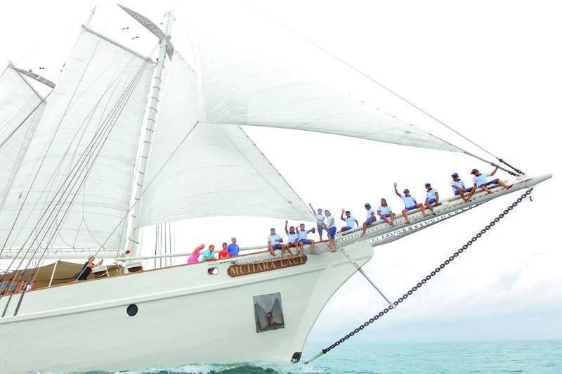 a group of people on a boat aboard MUTIARA LAUT Yacht for Sale