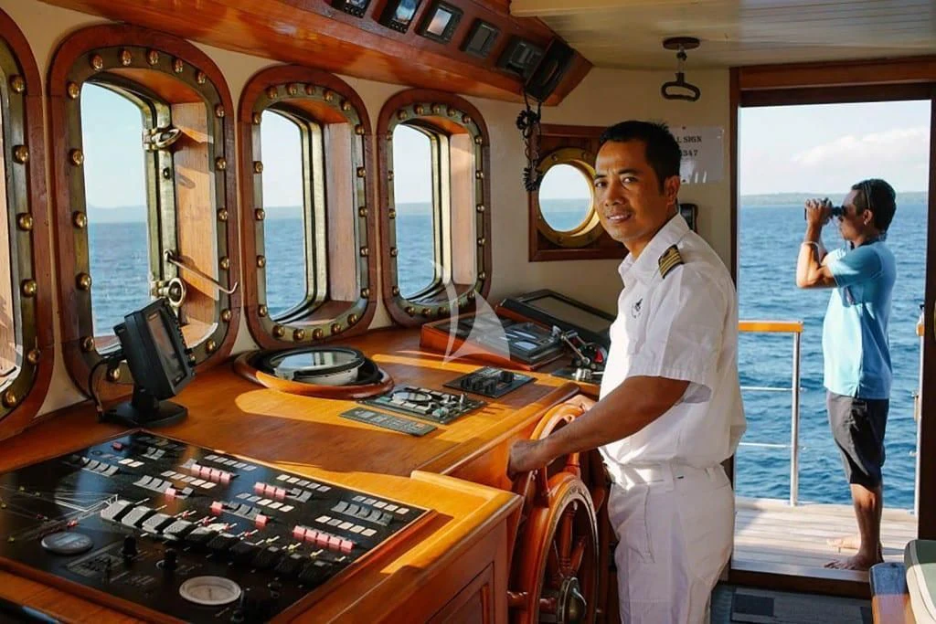 a person standing in front of a machine aboard MUTIARA LAUT Yacht for Sale