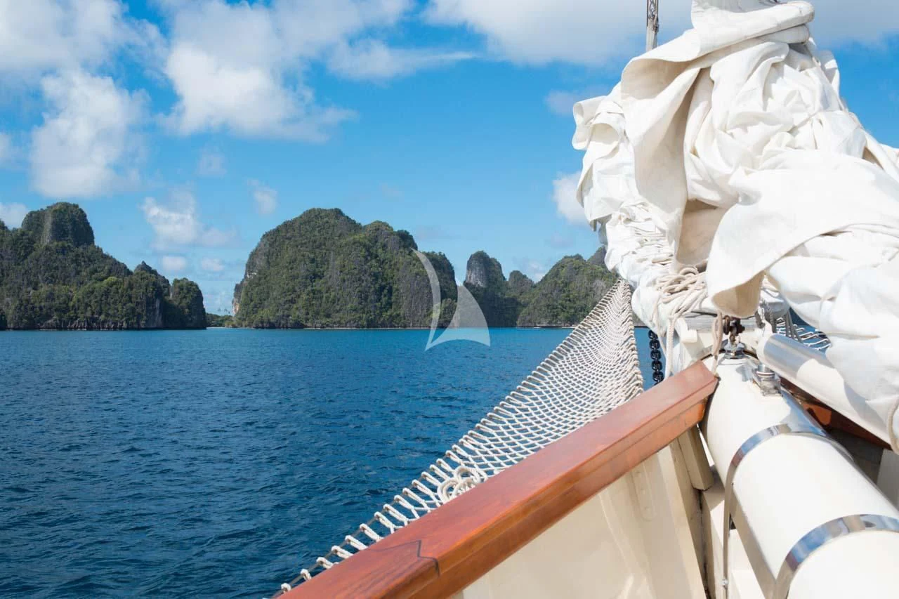 a boat on the water aboard MUTIARA LAUT Yacht for Sale