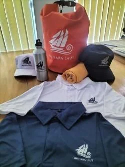 a group of different colored shirts aboard MUTIARA LAUT Yacht for Sale