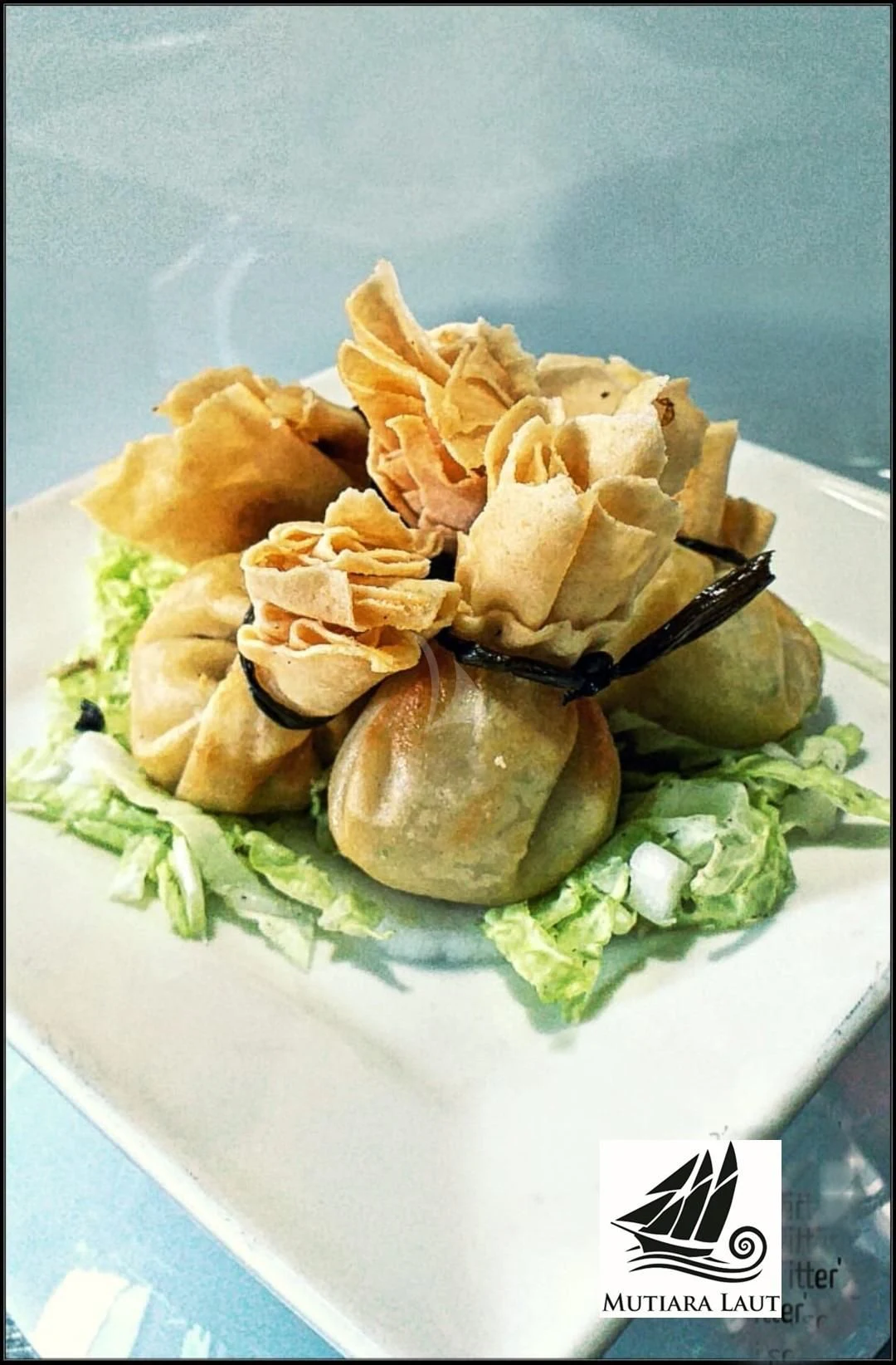 a plate of food aboard MUTIARA LAUT Yacht for Sale