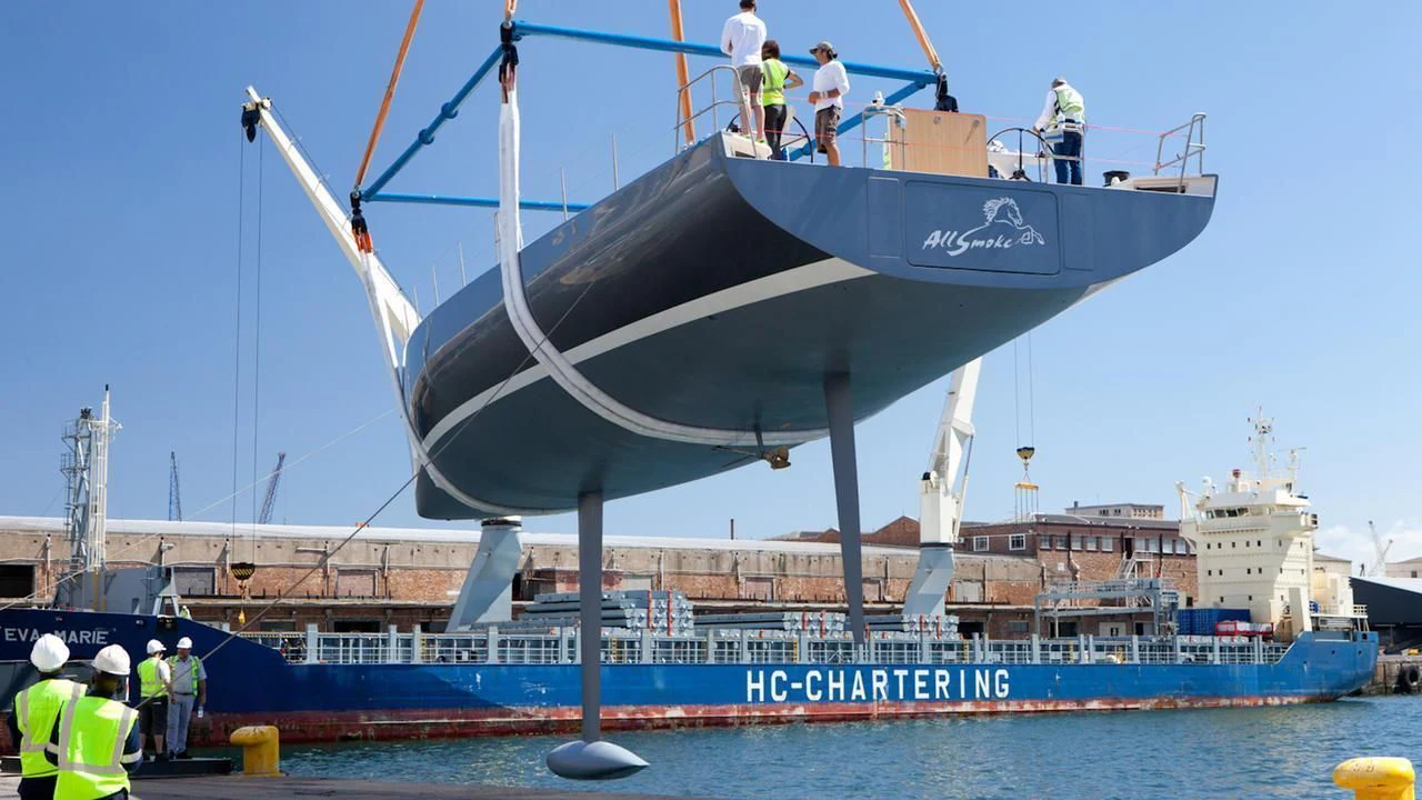 a large boat with a group of people on it aboard ALLSMOKE Yacht for Sale