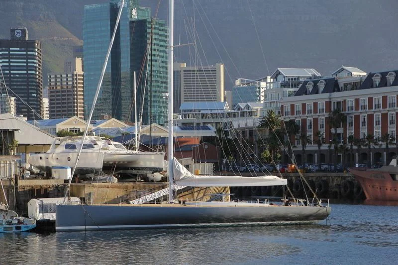 a cityscape with boats and buildings aboard ALLSMOKE Yacht for Sale