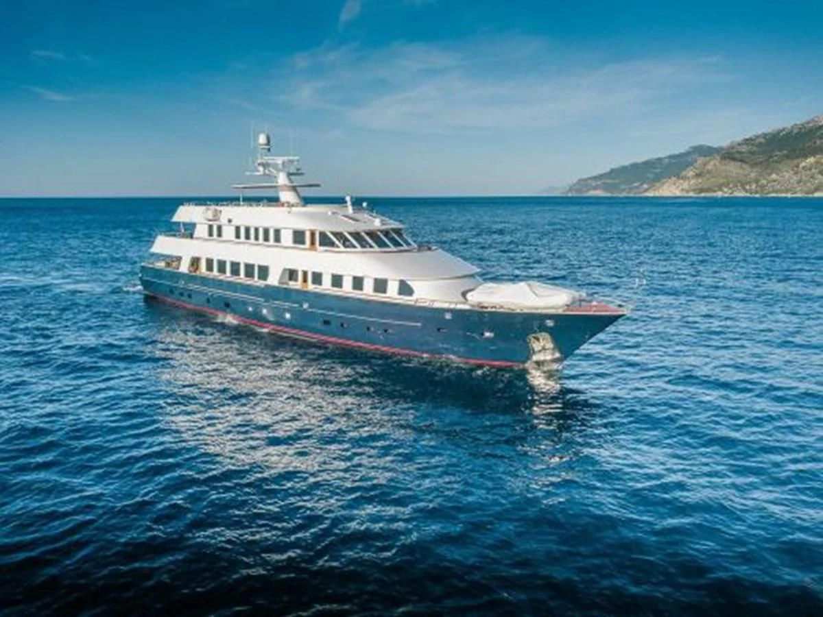 a large white boat in the water aboard CHARISMA Yacht for Sale