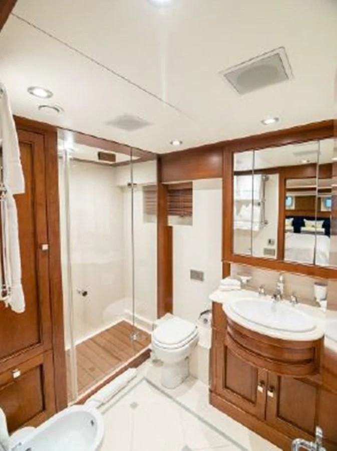 a bathroom with a sink and toilet aboard CHARISMA Yacht for Sale