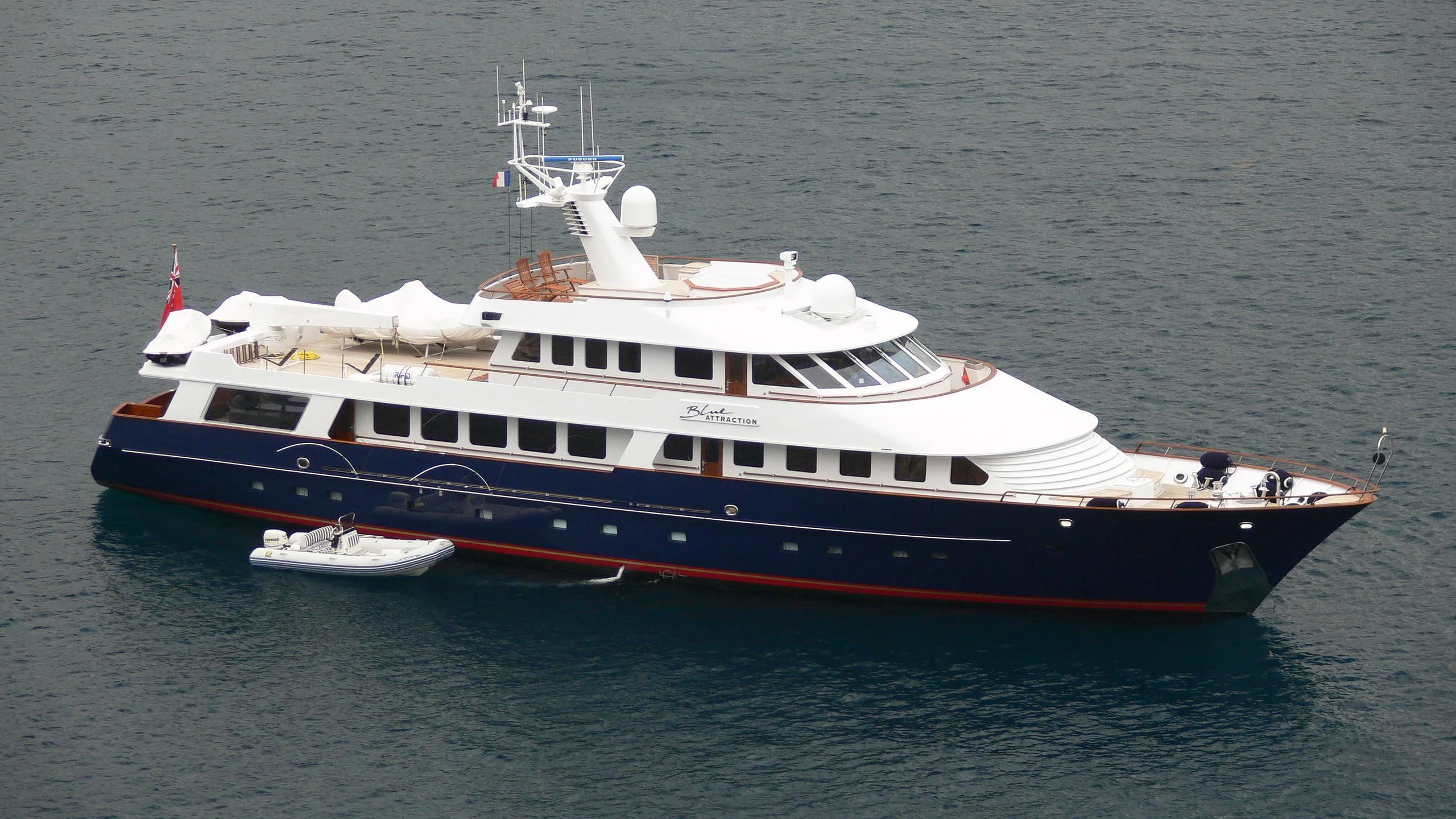a large boat in the water aboard CHARISMA Yacht for Sale