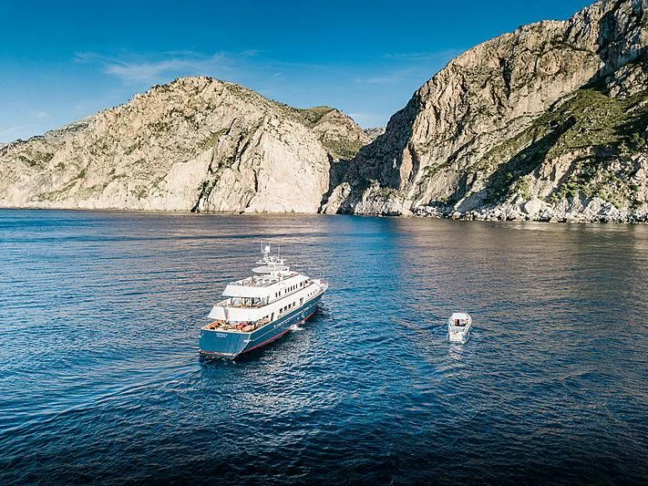 a boat sailing in the sea aboard CHARISMA Yacht for Sale