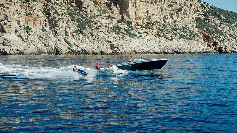 a group of people in a boat aboard CHARISMA Yacht for Sale