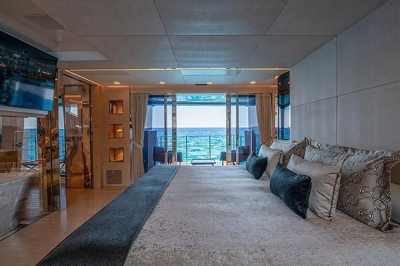 a large living room with a large glass door aboard LEL Yacht for Sale