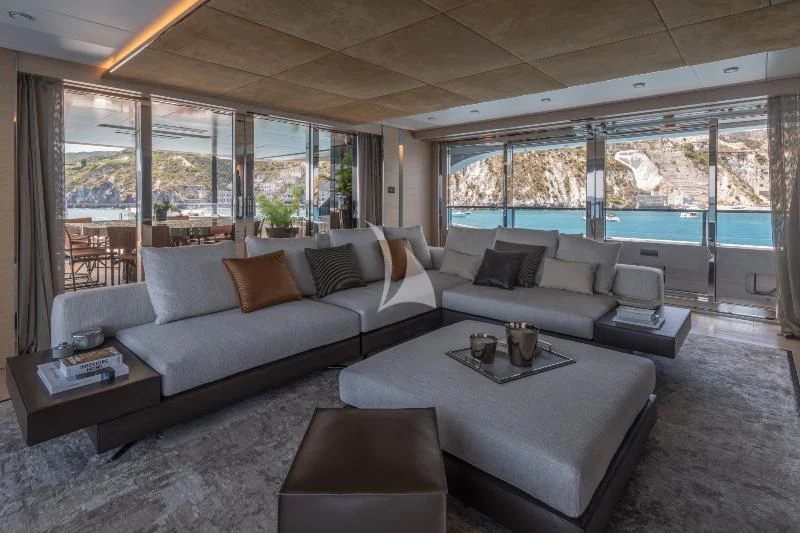 a living room with a large window aboard LEL Yacht for Sale