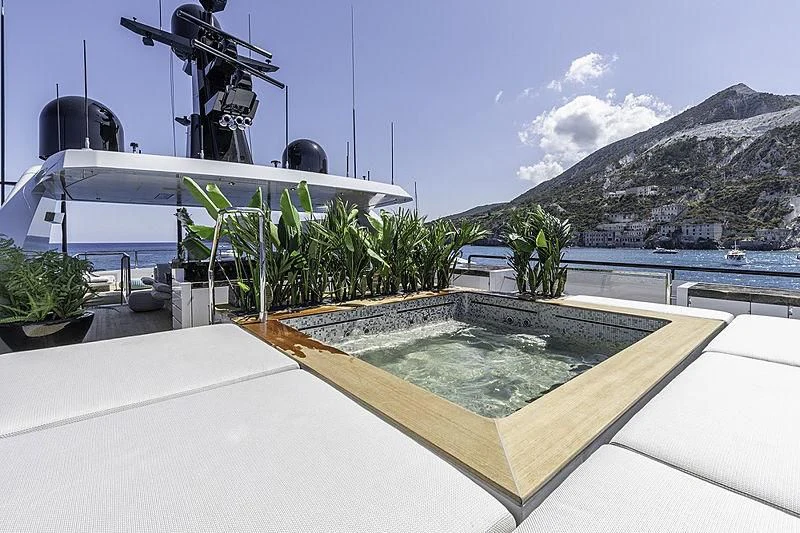 a pool with a satellite dish on top of it aboard LEL Yacht for Sale