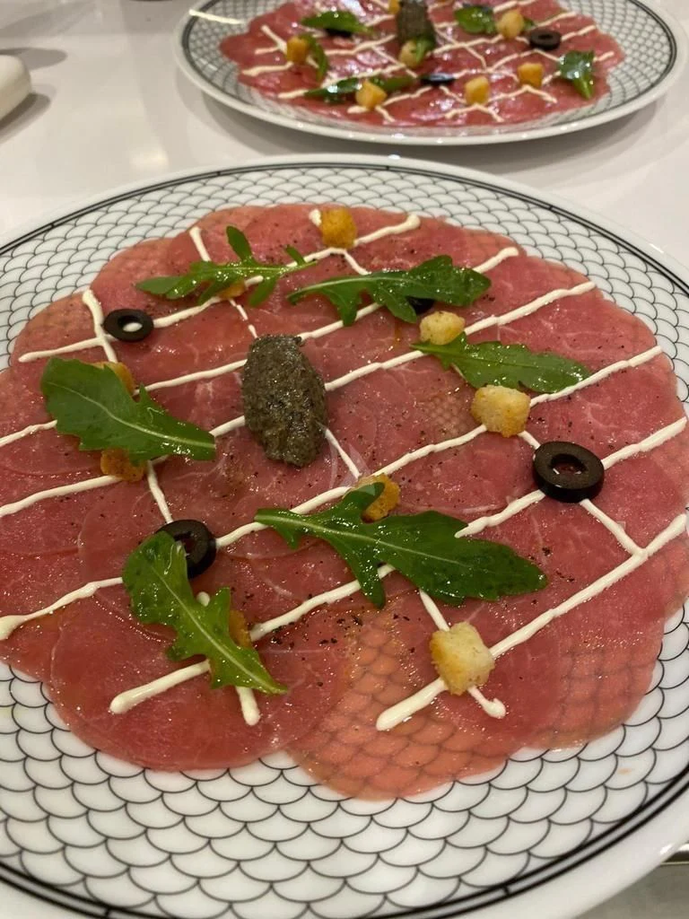 a plate of food aboard LEL Yacht for Sale