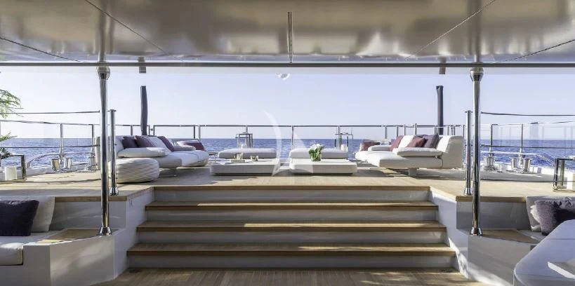 a deck with a view of the ocean and a deck aboard LEL Yacht for Sale