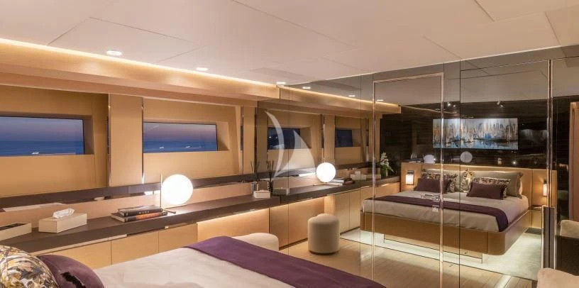 a room with a bed and a tv aboard LEL Yacht for Sale
