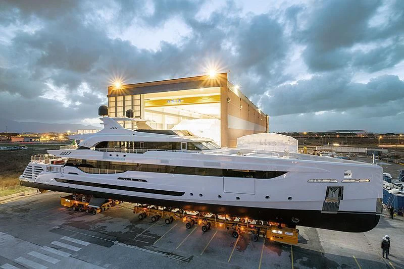 a large cruise ship in front of a large building aboard LEL Yacht for Sale
