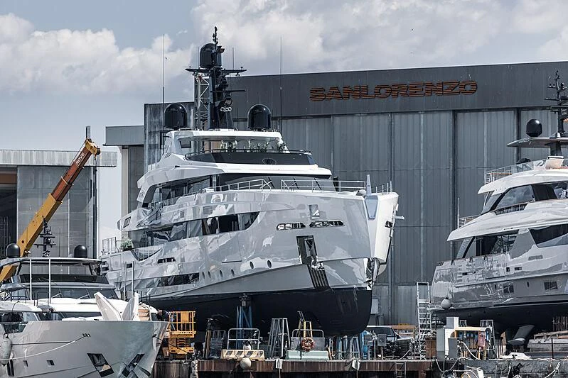 a large white ship docked aboard LEL Yacht for Sale