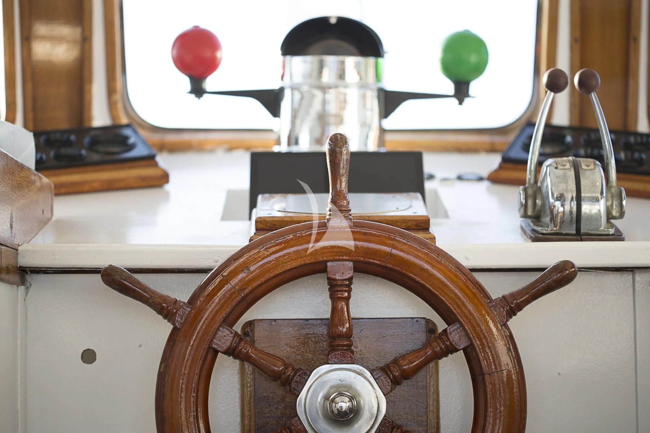 a wooden violin with a case aboard COSMOS Yacht for Sale