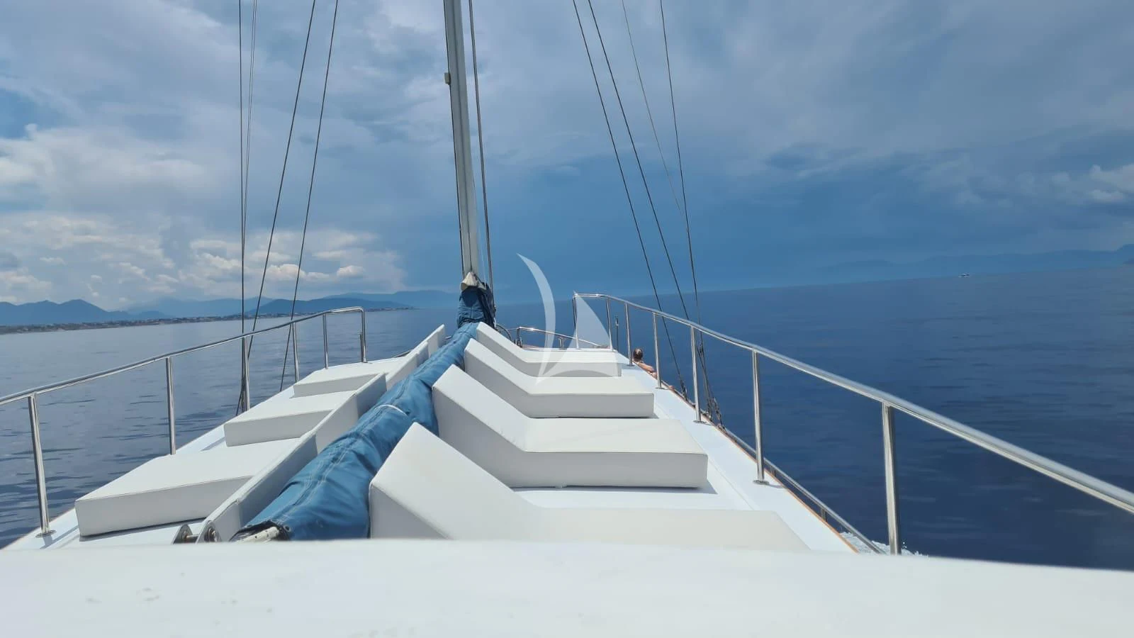 a boat on the water aboard COSMOS Yacht for Sale