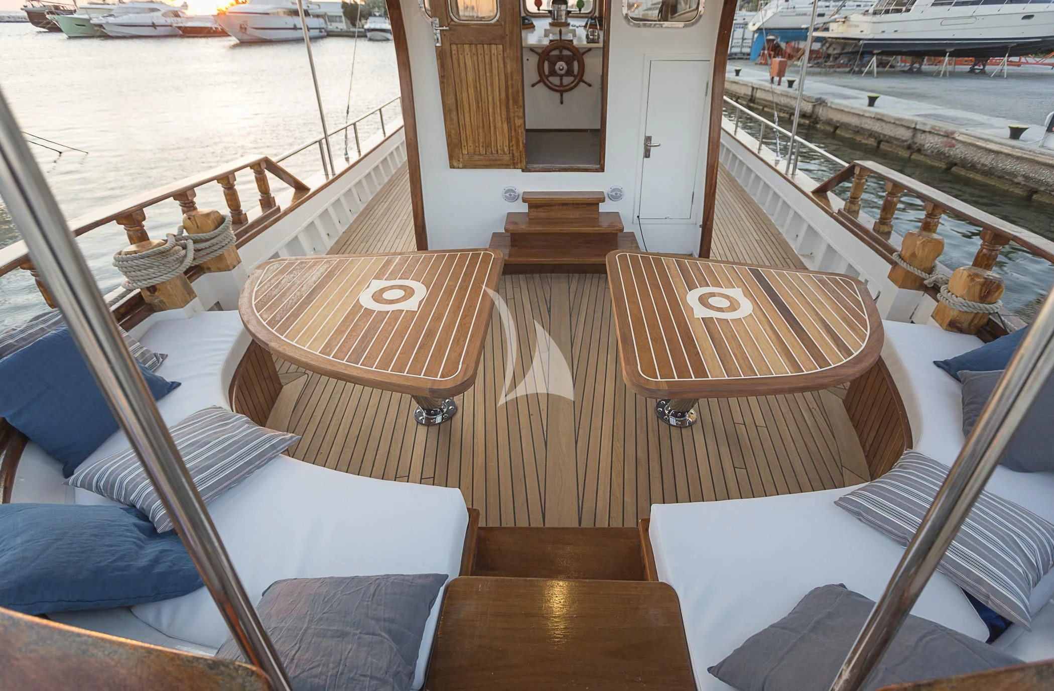 a boat with a bench aboard COSMOS Yacht for Sale
