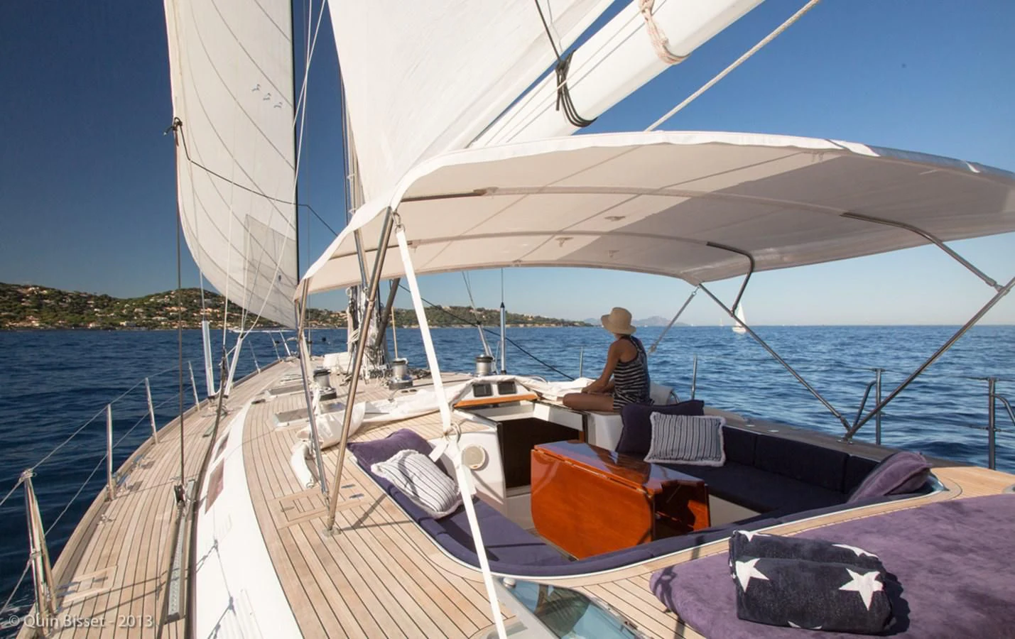 a person sitting on a boat aboard FAR OUT Yacht for Sale