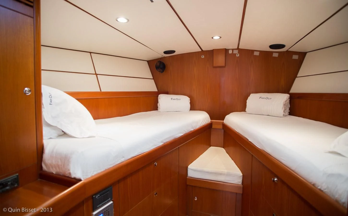 a couple of beds in a room aboard FAR OUT Yacht for Sale